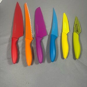 Kai Pure Komachi 2 kitchen knives with matching sheaths .. Retails $139.